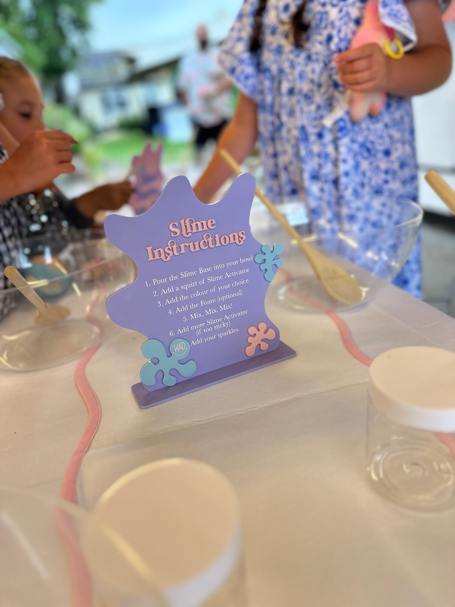 Kids at a Wonder & Dash Slime Party